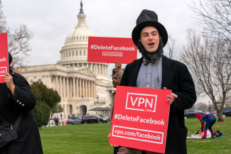 Facebook protester with Delete Facebook sign, Washington DC