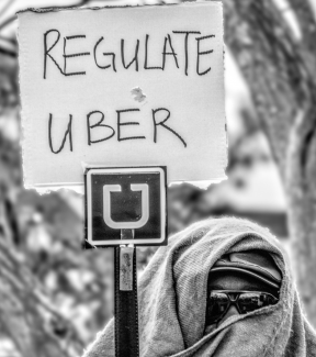 Protesting the recent 30% reduction in pay to UBER drivers