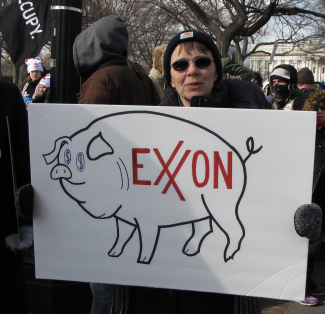 Exxon are greedy pigs protest