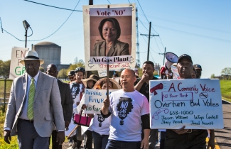 Protesters march against a proposed Entergy gas plant in Louisiana's 'Cancer Alley' - Photographer Julie Dermansky
