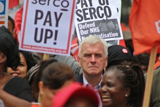 Striking Serco cleaners from Barts hospital march in east London 15th July 2017. With John McDonnell.