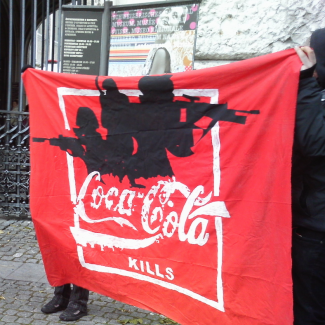 Protest against Coca Cola Christmas PR Campaign in Zurich PHOTO Anarchistische Aktion